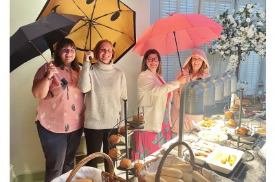 Brollies and burgers: Rain fails to dampen spirits at Chamber's summer BBQ